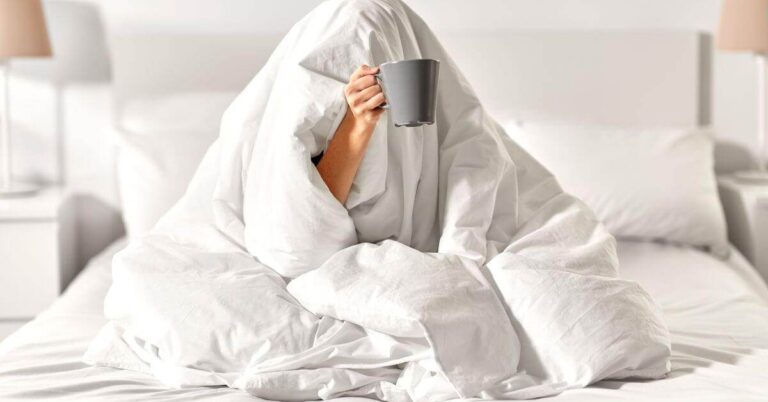 Coffee In Bed Under Duvet