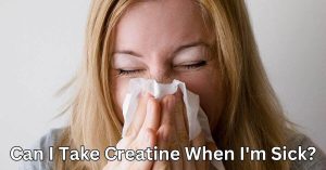 Can I Take Creatine When I'm Sick? Woman Sneeing into a tissue